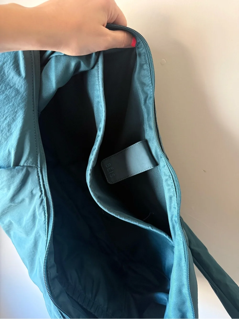 BEIS The oversized crescent catchall in teal